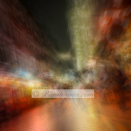 Abstract street scene in Amsterdam with motion blur, featuring warm red, orange, and yellow tones, and blurred buildings and figures in an impressionistic style.